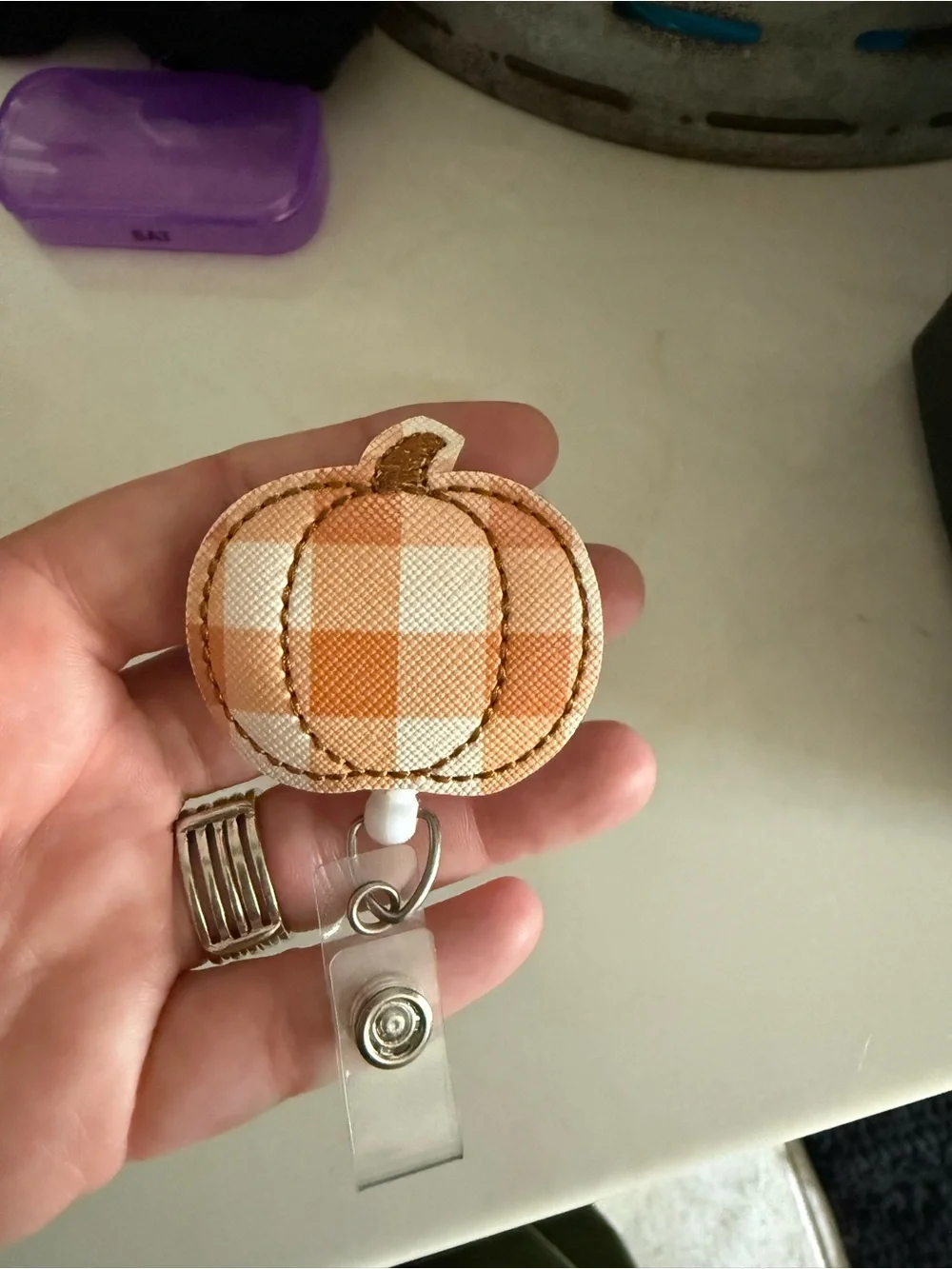 Plaid Pumpkin Badge Reel - Orange & Cream